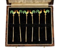 SET OF SIX VINTAGE SILVER GILT COCKTAIL STICKS, with green, yellow, and red enamel cockerel