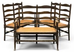 THREE STAINED ASH LADDERBACK TWO-SEATER SETTEES, in the Arts & Crafts style, 108 (h) x 101 (w) x