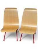 JEAN PROUVÉ ANTONY STYLE SINGLE CHAIRS, with natural plywood seat and red enamelled steel frame (2),