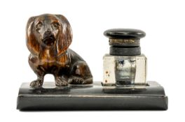 VINTAGE WOODEN DESK STAND, glass inkwell with hinged lid, carved model of dog to side, 9 (h) x 14 (