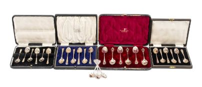 FOUR CASED SETS OF SILVER TEASPOONS, including six Walker & Hall, Sheffield 1914, the remaining sets