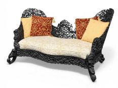 BURMESE EBONISED HARDWOOD SETTEE, frame ornately carved and pierced with flowers and leaves,