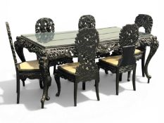 ANGLO-INDIAN EBONISED DINING FURNITURE, ornately carved detail, comprising rectangular table, 79 (h)