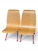 JEAN PROUVÉ ANTONY STYLE SINGLE CHAIRS, with natural plywood seat and red enamelled steel frame (2),