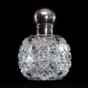 GLOBULAR CUT GLASS SCENT BOTTLE with hinged silver lid, 12.5cms (h); and pair of Georgian silver