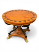 EMPIRE STYLE CENTRE TABLE, the circular top having a geometrically inlaid design in exotic