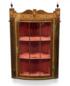 MAHOGANY INLAID BOW-FRONT HANGING DISPLAY CABINET, in the Georgian style, fitted with two shaped