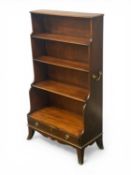 MAHOGANY 'WATERFALL' BOOKCASE with four open shelves, drawer to base, brass drop side handles,