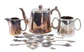ASSORTED SILVER / WHITE METAL SPOONS, and a silver-plated three-piece tea service Provenance: