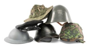 DUTCH OR SCANDINAVIAN STEEL HELMET, together with a steel helmet, probably Swiss, WWII tin helmet,