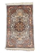 KASHMIRI SILK PRAYER RUG, late 20th century, with fawn ground and palmette border, 100 x 62cms