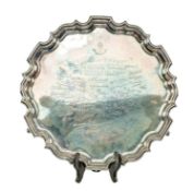 SUBSTANTIAL GEORGE V CIRCULAR SILVER SALVER, with pie crust rim, on three scroll feet, inscribed '