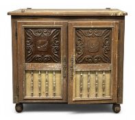 FRENCH WALNUT SIDE CABINET, unusually with a hinged top and two carved panel cupboard doors, 94 (