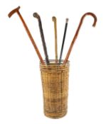 SILVER-MOUNTED EBONISED WALKING CANE, maker William Lindop, Chester 1922, 86cms (l); and four