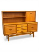 MID-CENTURY TEAK SIDEBOARD, raised back with open shelf and fall-front cupboard, three centre