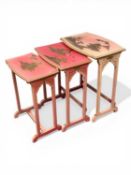 THREE CHINESE CHINOISERIE NESTING TABLES, pink with hand-painted scenes, 62 (h) x 51 (w) x 35cms (d)