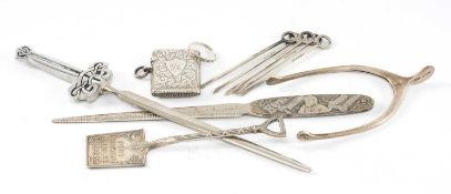 SILVER VESTA CASE with scroll engraved decoration, 35mms; hallmarked silver wishbone sugar tongs,