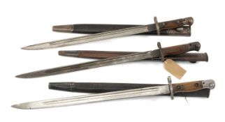 THREE HENDERSON 1907 ENFIELD BAYONETS, with scabbards Provenance: deceased estate Wirral PLEASE