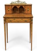 EDWARDIAN SATINWOOD BONHEUR DE JOUR, the raised back having a pierced gilded brass gallery, two