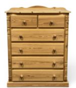 MODERN PINE CHEST of two short and four long drawers, turned knob handles, 118 (h) x 90 (w) x