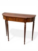 ARTHUR BRETT MAHOGANY DEMILUNE SIDE TABLE, frieze with applied relief mouldings, on reeded turned