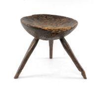 PRIMITIVE DISH TOPPED STOOL, probably early 19 century, tripod base, shallow circular seat,