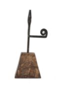 RUSH LIGHT HOLDER, wrought iron scrolled counter weight holding jaw held by single rivet, on later