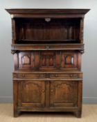 18TH CENTURY WELSH OAK TRIDARN, panel-back canopy top on turned supports, central section of arch