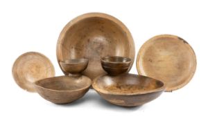 COLLECTION OF TREEN BOWLS comprising two turned dairy bowls, 40cms and 33cms (diam.); together
