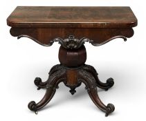VICTORIAN FLAME MAHOGANY FOLD-OVER GAMES TABLE, blue baize interior, on four scrolled supports