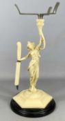 ART NOUVEAU PAINTED METAL CAKE STAND, figural column, holding a knife, 28cms (h) Provenance: private