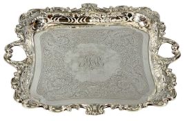 EDWARDIAN SILVER TWO-HANDLED TRAY, of square form, moulded border, scroll engraved centre and with