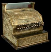 NATIONAL CASH REGISTER circa 1907, American brass model profusely chased in the 'Empire' pattern,