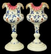 PAIR OF VICTORIAN OPALINE VASES, floral painted with fluted rims and pink interior, 35cms (h)