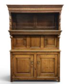 18TH CENTURY WELSH OAK TRIDARN, carved canopy over two cupboard door centre, two cupboard door base,