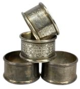 SILVER NAPKIN RINGS, cased Edwardian pair, Saunders & Shepherd, 1907, and George V pair with foliate