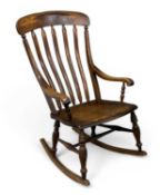 POLISHED PINE FARMHOUSE TYPE ROCKING CHAIR, 99 (h) x 58 (w) x 68cms (d) Provenance: deceased