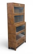 GLOBE WERNICKE STYLE GLAZED FOUR-TIER LIBRARY BOOKCASE, stackable sections, bears brass