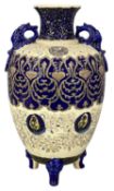 MOLARONI PESARO TYPE VASE, 1920s, with side handles and enamelled type decoration, on three feet,