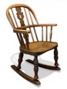19TH CENTURY OAK CHILD'S WINDSOR-STYLE ROCKING CHAIR, stick and hoop back, 70 (h) x 42 (w) x
