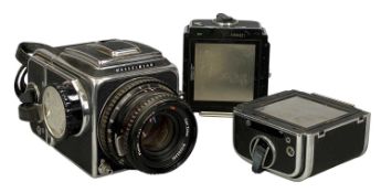 HASSELBLAD SLR CAMERA, Carl Zeiss Planar 1:2.8 f=80mm lens and three film magazines Provenance: