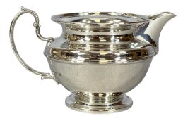GEORGE V SILVER MILK JUG, of circular waisted form, Elkington & Co., 7cms (h), 4.75ozt Provenance: