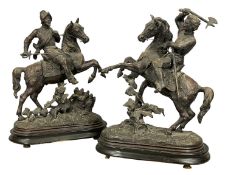 PAIR OF BRONZED SPELTER FIGURES, late 19th century, warriors on horseback, on ebonised plinths,