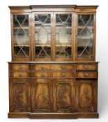 QUALITY 20TH CENTURY MAHOGANY BREAKFRONT BOOKCASE CUPBOARD, dentil cornice over four glazed doors,