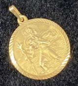 9CT GOLD CIRCULAR ST. CHRISTOPHER PENDANT, 23mms (diam.), 2.3g Provenance: private collection
