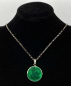 CIRCULAR MALACHITE & MOTHER OF PEARL PENDANT, white metal mount, 25mms (diam.) excluding