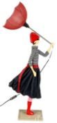 SKITSO 'WINDSWEPT LADY' FIGURAL TABLE LAMP, girl in red hat, blue and white striped jumper, denim