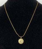 9CT GOLD CIRCULAR LOCKET, with floral engraved decoration, 13mms (diam.), with 9ct gold fine link