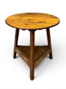 PINE CRICKET TABLE, with base shelf, 74 (h) x 76cms (diam.) Provenance: private collection Ynys Môn