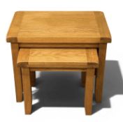 MODERN LIGHT OAK NEST OF TWO SIDE TABLES, largest 54 (h) x 65 (w) x 40cms (d) (2) Provenance: